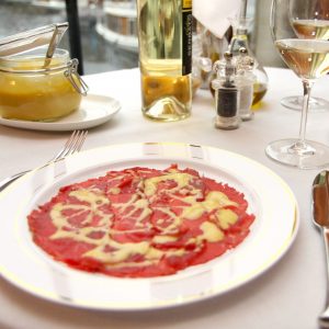 Carpaccio di orata con mele, arancio e limone