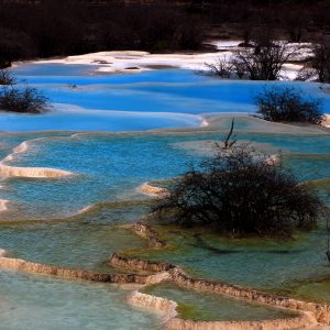 Cina: lo spettacolo di Huanglong nel Parco Nazionale di Jiuzhaigou