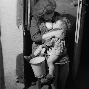 GERMANY. Bonn. A mother breastfeeding her child as long as possible, to save him from malnutrition. 1946.