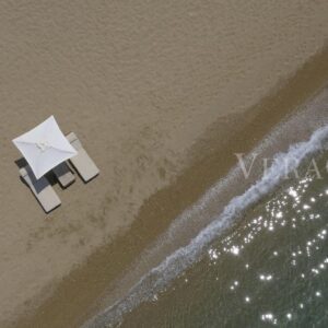 Romanos beach, umbrellas, aerial photo, drone, by Orfeas Kalafatis